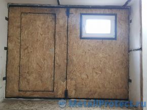 С остеклением, вид изнутри. Отделка - OSB Ворота с окном