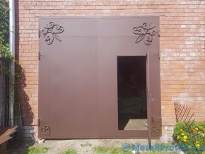 Украшенные коваными элементами Кованые ворота для высокого гаража